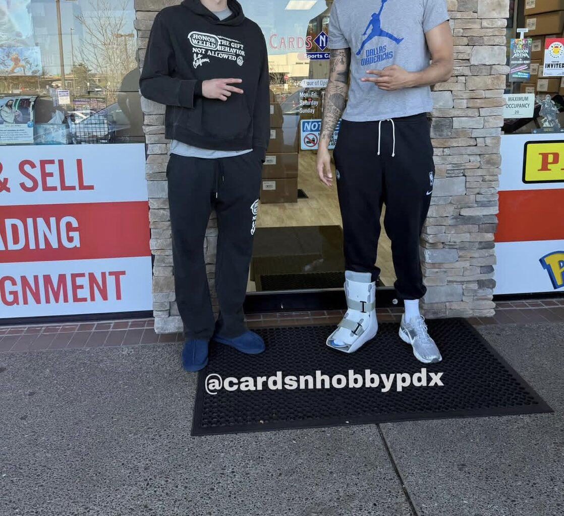 Coop and Dereck at a card shop hanging but..... Lively still in a boot 👀