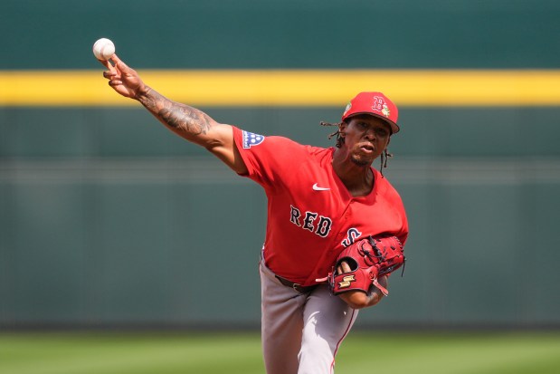 Boston Red Sox pitcher Brayan Bello delivers in the first inning of a spring training baseball game against the Atlanta Braves in North Port, Fla., Friday, Feb. 27, 2026. (AP Photo/Gerald Herbert)