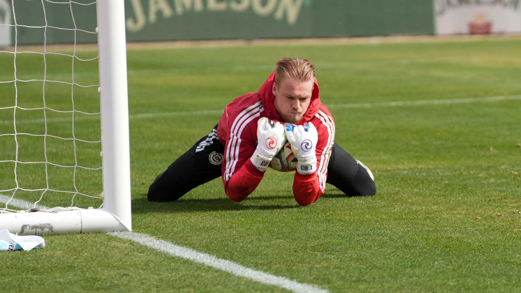 Chicago Fire's Chris Brady catches the ball during warmups ahead of a at Soldier Field on February 28, 2026