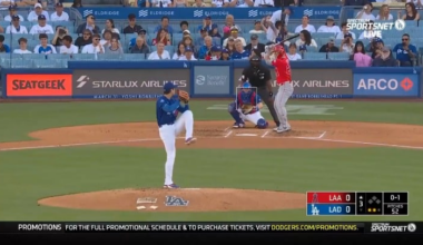 Trout has a laugh after getting struck in the foot by an Ohtani sinker.