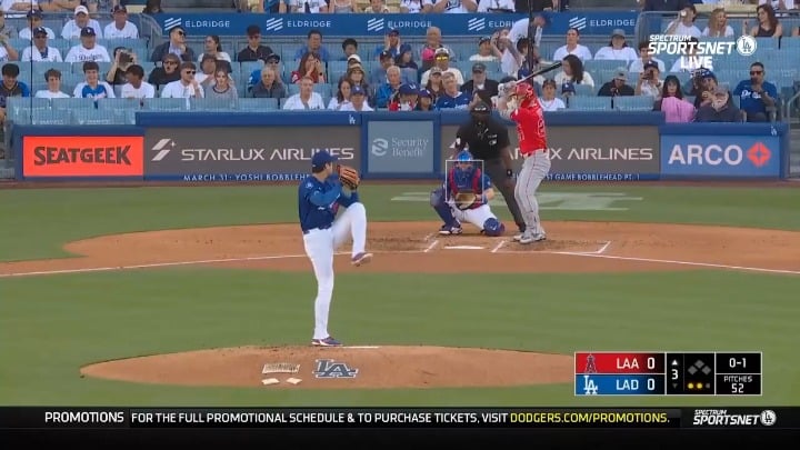 Trout has a laugh after getting struck in the foot by an Ohtani sinker.