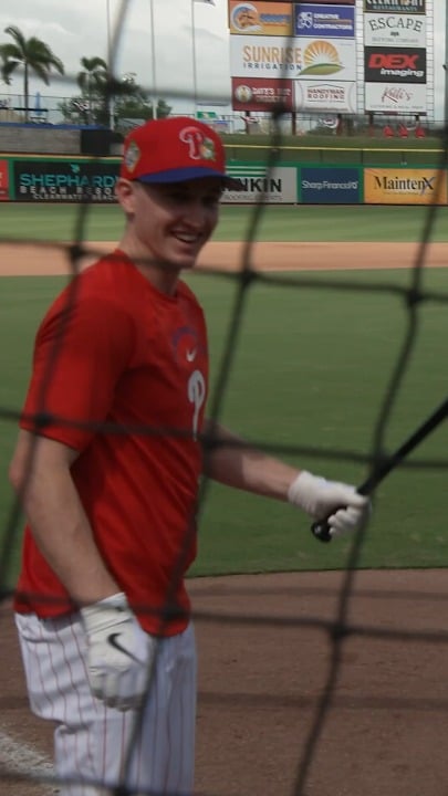 England Cricket captain Harry Brook attempts to hit a home run at Phillies spring training, with the help of Chase Utley