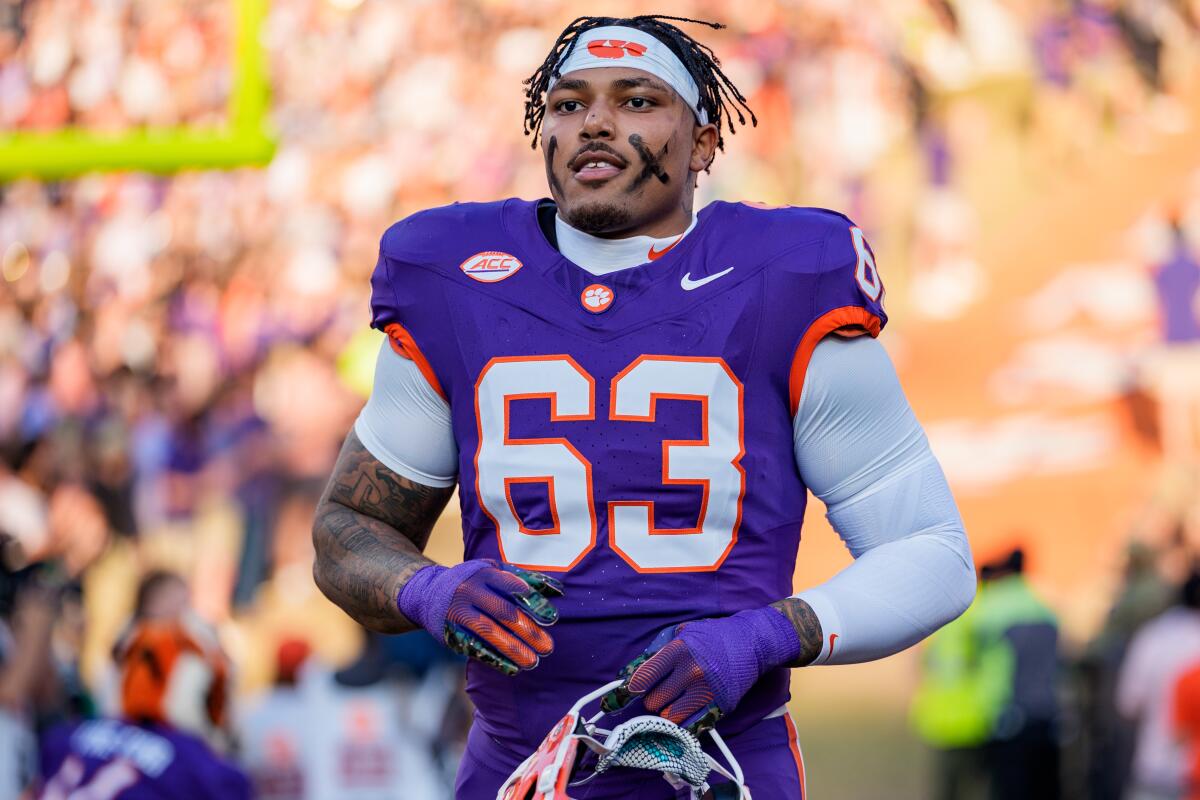 Clemson defensive end T.J. Parker jogs on the field before a game against Furman on Nov. 22.
