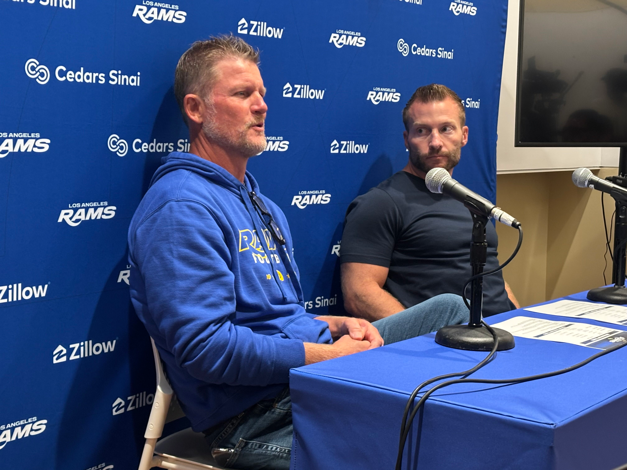 Rams general manager Les Snead, left, and coach Sean McVay speak to reporters.