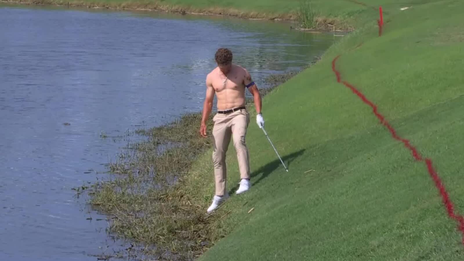 Michael Brennan goes shirtless in attempt to hit shot out of water at Zurich Classic