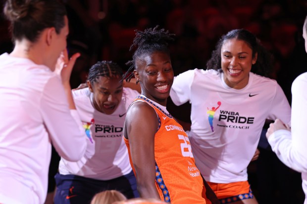 UNCASVILLE, CT - JUNE 20: Saniya Rivers of the Connecticut Sun smiles during the huddle before the game against the Dallas Wings on June 20, 2025 at the Mohegan Sun Arena in Uncasville, Connecticut. (Photo by Chris Marion/NBAE via Getty Images)