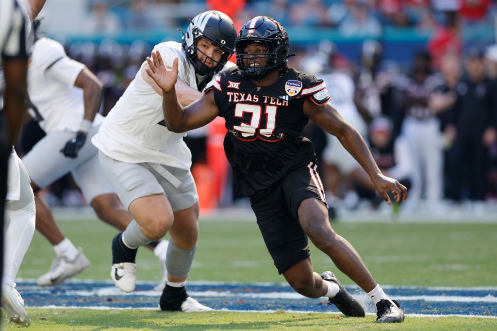 David Bailey #31 of the Texas Tech Red Raiders rushes on defense during the College Football Playoff Quarterfinal at the Capital One Orange Bowl against the Oregon Ducks on January 01, 2026 at Hard Rock Stadium in Miami Gardens, Florida.