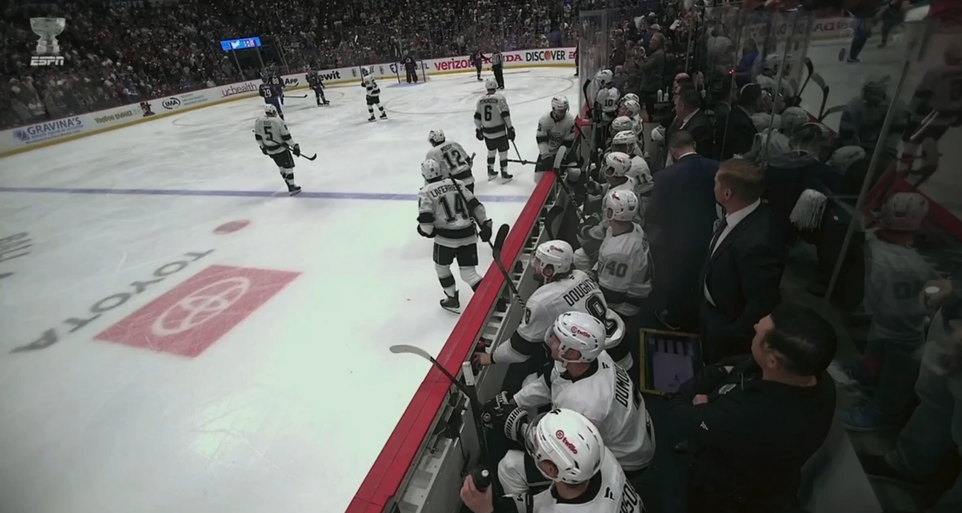 Fans were banging the glass behind the LA bench and it shattered