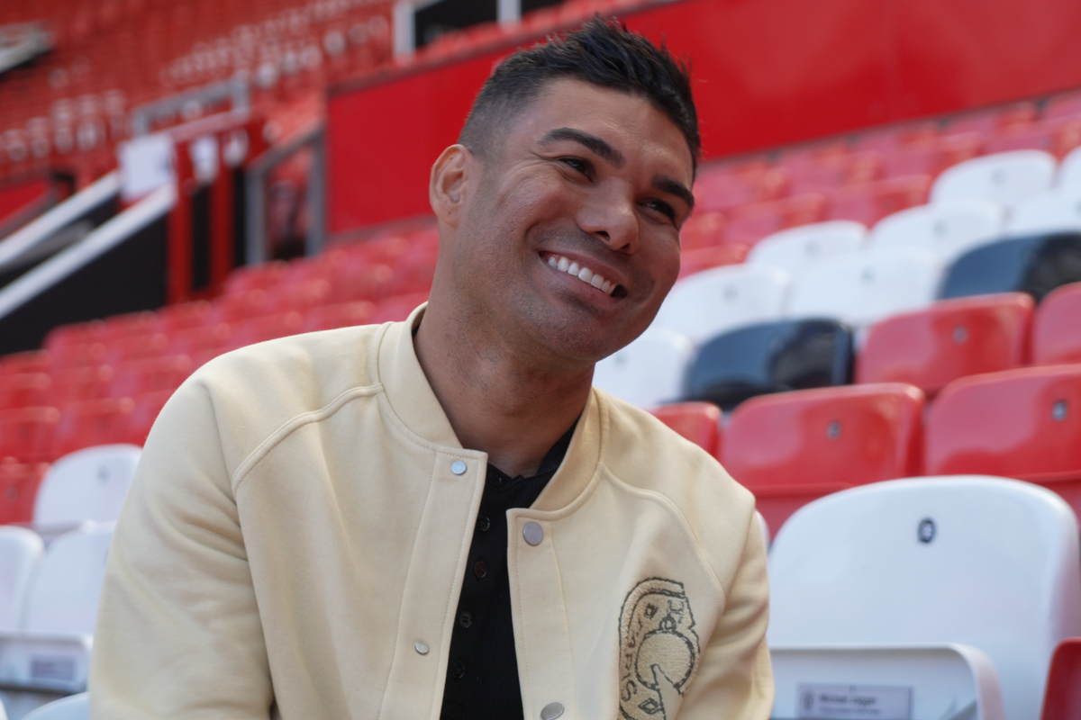 Casemiro speaks to Rio Ferdinand for an interview at Old Trafford