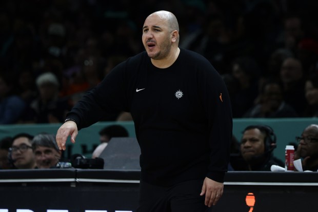 Connecticut Sun head coach Rachid Meziane directs his team during a WNBA basketball game against the New York Liberty in New York on Friday, May 8, 2026. (AP Photo/Adam Hunger)