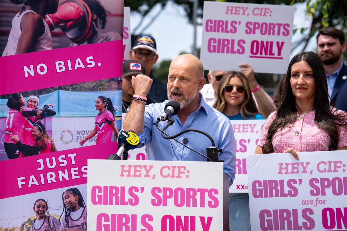 Candidate Steve Hilton speaks at a news conference opposing transgender athlete participation.
