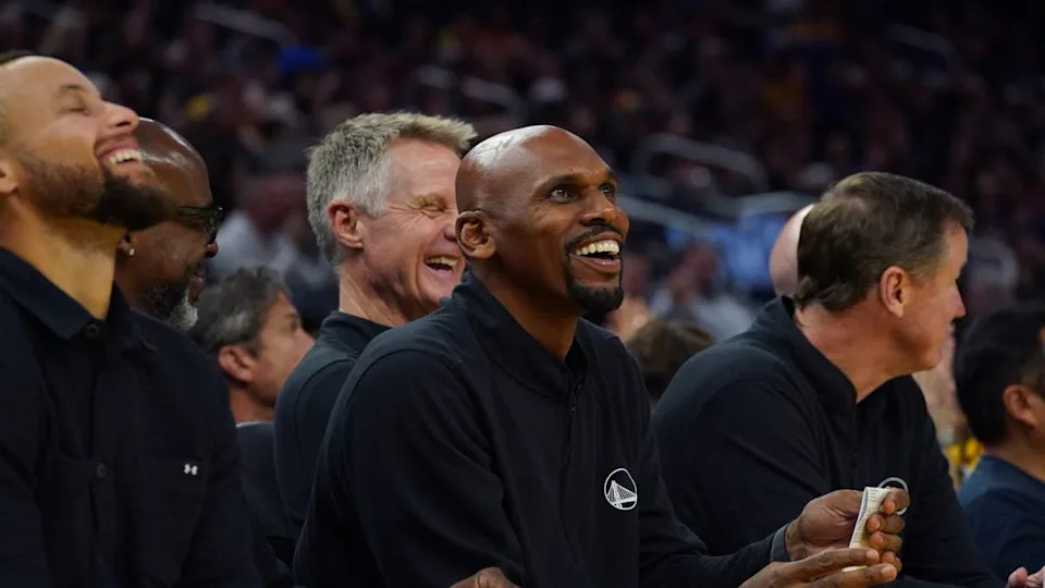 Golden State Warriors coach Jerry Stackhouse smiles along with a laughing <a class="link " href="https://sports.yahoo.com/nba/players/4612/" data-i13n="sec:content-canvas;subsec:anchor_text;elm:context_link" data-ylk="slk:Stephen Curry;sec:content-canvas;subsec:anchor_text;elm:context_link;itc:0" data-yga="{"yLinkElement":"context_link","yModuleName":"content-canvas","yLinkText":"Stephen Curry","ySubModuleName":"anchor_text","yHasCommerce":false}">Stephen Curry</a> (30)© David Gonzales-Imagn Images