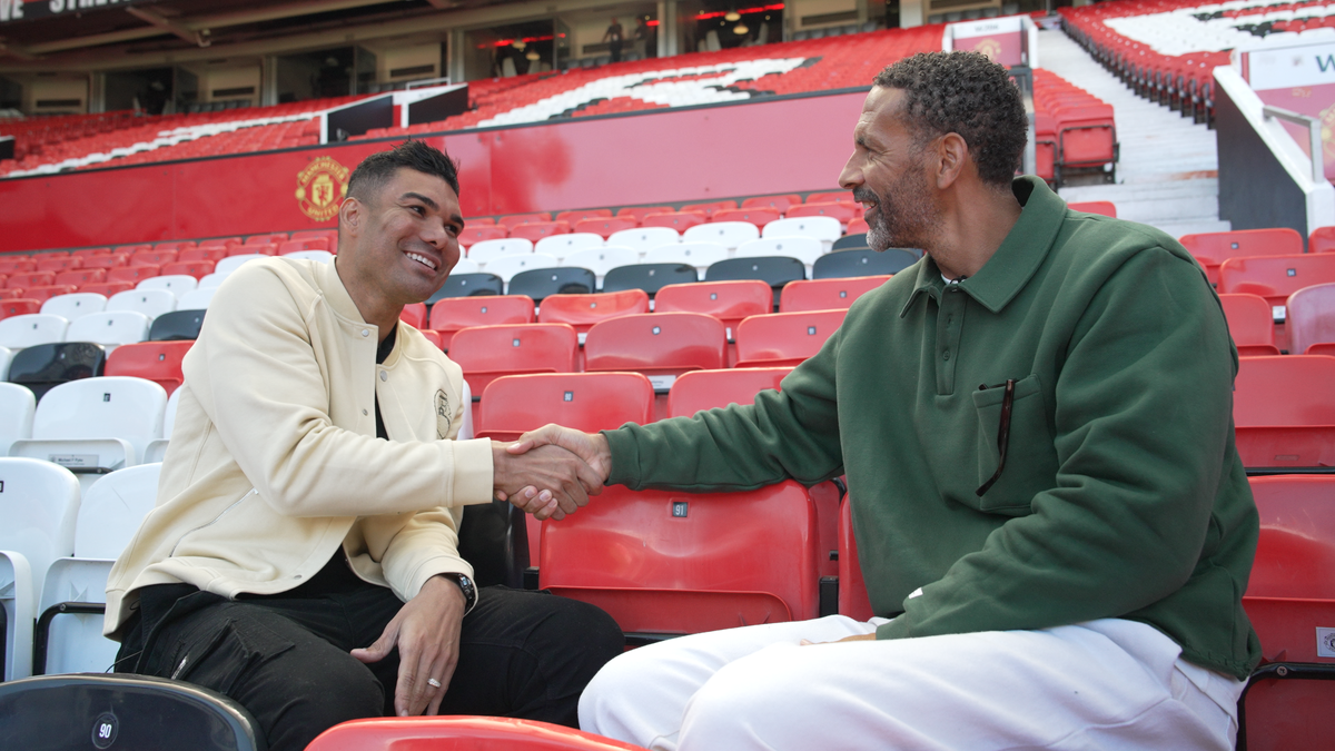 Casemiro speaks to Rio Ferdinand for an interview at Old Trafford
