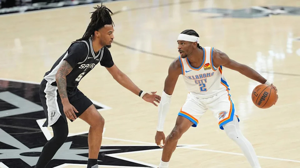May 28, 2026; San Antonio, Texas, USA; Oklahoma City Thunder guard Shai Gilgeous-Alexander (2) dribbles the ball against San Antonio Spurs guard <a class="link " href="https://sports.yahoo.com/nba/players/10290/" data-i13n="sec:content-canvas;subsec:anchor_text;elm:context_link" data-ylk="slk:Stephon Castle;sec:content-canvas;subsec:anchor_text;elm:context_link;itc:0" data-yga="{"yLinkElement":"context_link","yModuleName":"content-canvas","yLinkText":"Stephon Castle","ySubModuleName":"anchor_text","yHasCommerce":false}">Stephon Castle</a> (5) in the first half during game six of the western conference finals for the 2026 NBA playoffs at Frost Bank Center. Mandatory Credit: Daniel Dunn-Imagn Images