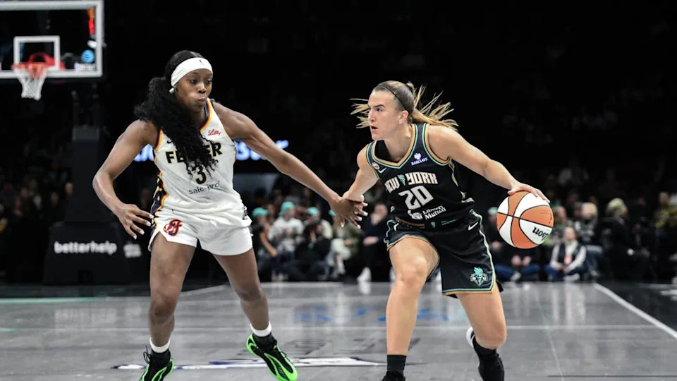 <a class="link " href="https://sports.yahoo.com/wnba/teams/new-york/" data-i13n="sec:content-canvas;subsec:anchor_text;elm:context_link" data-ylk="slk:New York Liberty;sec:content-canvas;subsec:anchor_text;elm:context_link;itc:0" data-yga="{"yLinkElement":"context_link","yModuleName":"content-canvas","yLinkText":"New York Liberty","ySubModuleName":"anchor_text","yHasCommerce":false}">New York Liberty</a> guard <a class="link " href="https://sports.yahoo.com/wnba/players/6358/" data-i13n="sec:content-canvas;subsec:anchor_text;elm:context_link" data-ylk="slk:Sabrina Ionescu;sec:content-canvas;subsec:anchor_text;elm:context_link;itc:0" data-yga="{"yLinkElement":"context_link","yModuleName":"content-canvas","yLinkText":"Sabrina Ionescu","ySubModuleName":"anchor_text","yHasCommerce":false}">Sabrina Ionescu</a> operates with the ball as Indiana Fever guard Raven Johnson.John Jones-Imagn Images