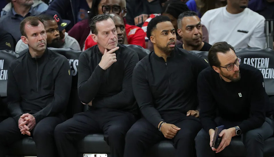 Cleveland Cavaliers coach Kenny Atkinson, left center, and his coaching staff watch as the New York Knicks run away with Game 4 of the Eastern Conference Finals on May 25, 2026, in Cleveland.