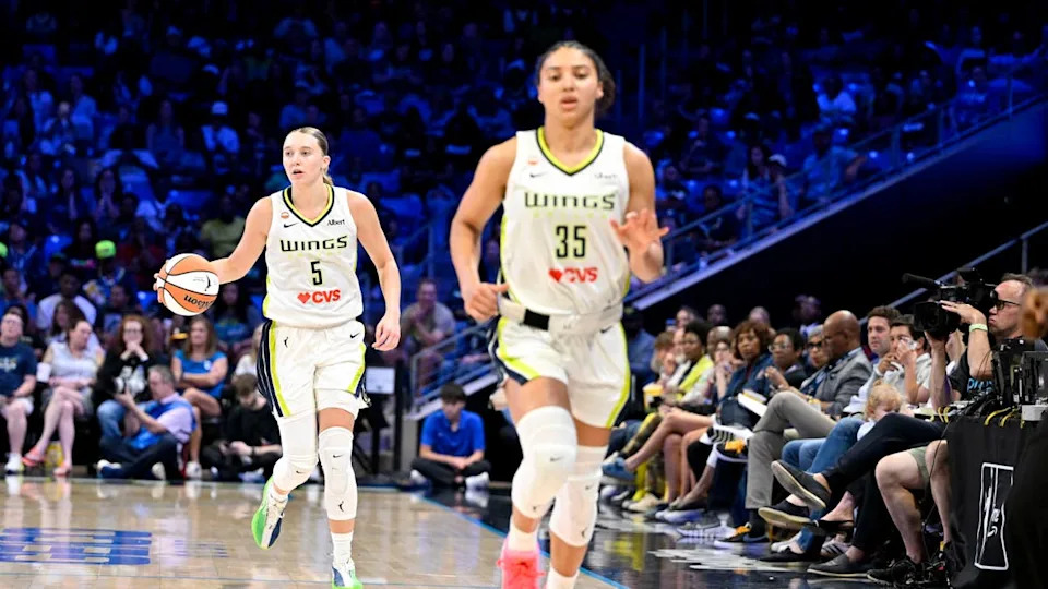 Dallas Wings guard Paige Bueckers bringing the ball up court behind guard Azzi Fudd against the Minnesota Lynx.Jerome Miron-Imagn Images