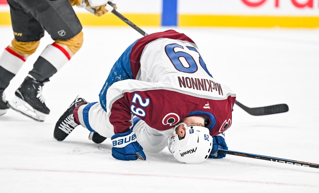Colorado Avalanche's Nathan MacKinnon leaves Stanley Cup Playoff game with knee injury