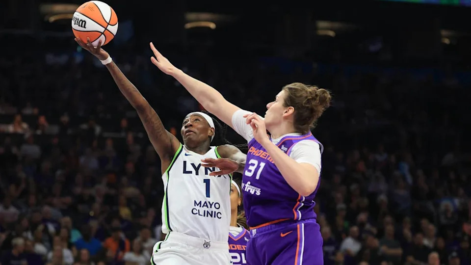 Minnesota Lynx forward <a class="link " href="https://sports.yahoo.com/wnba/players/5191/" data-i13n="sec:content-canvas;subsec:anchor_text;elm:context_link" data-ylk="slk:Natasha Howard;sec:content-canvas;subsec:anchor_text;elm:context_link;itc:0" data-yga="{"yLinkElement":"context_link","yModuleName":"content-canvas","yLinkText":"Natasha Howard","ySubModuleName":"anchor_text","yHasCommerce":false}">Natasha Howard</a> (1) drives to the basket against Phoenix Mercury center Kyara Linskens (31).Mark J&period; Rebilas-Imagn Images