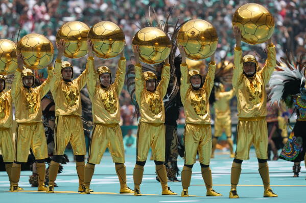 Performers take part in the openinig ceremony before the World Cup Group A soccer match between Mexico and South Africa in Mexico City, Thursday, June 11, 2026. ((AP Photo/Silvia Izquierdo)