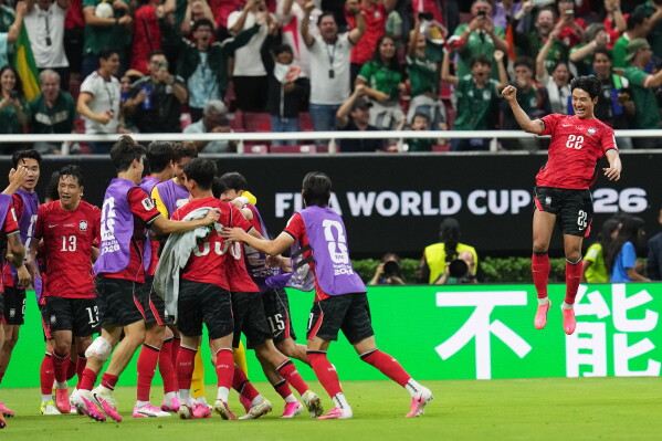 South Korea's Seol Young-woo (22) celebrates with his team after a goal during the World Cup Group A soccer against Czechia in Zapopan, near Guadalajara, Mexico, Thursday, June 11, 2026. (AP Photo/Dolores Ochoa)