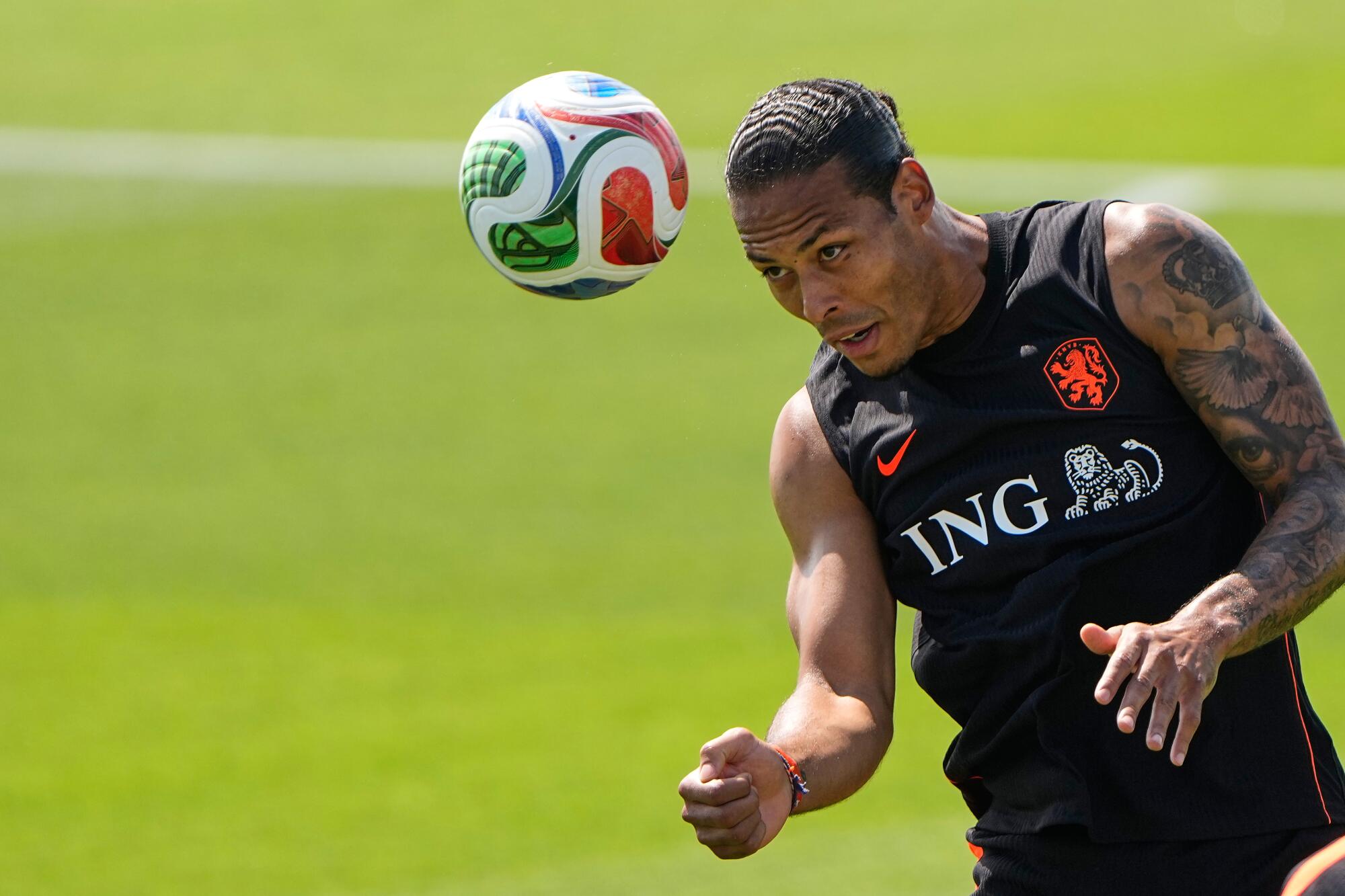 Netherlands' Virgil van Dijk practices for the World Cup soccer tournament.