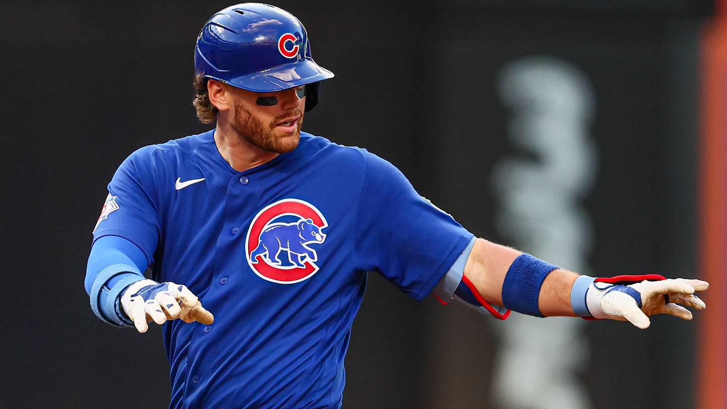 Jun 24, 2026; New York City, New York, USA;  Chicago Cubs catcher Carson Kelly (15) reacts after racing first base on an error during the fourth inning against the New York Mets at Citi Field. Mandatory Credit: Vincent Carchietta-Imagn Images