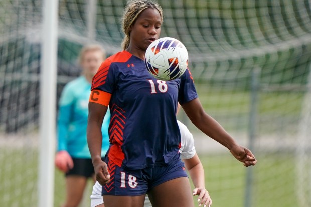 Oswego's Jordyn Washington (18) controls the ball against Waubonsie Valley during a Class 3A Oswego Regional semifinal game on Thursday, May 22, 2025. (Sean King / The Beacon-News)