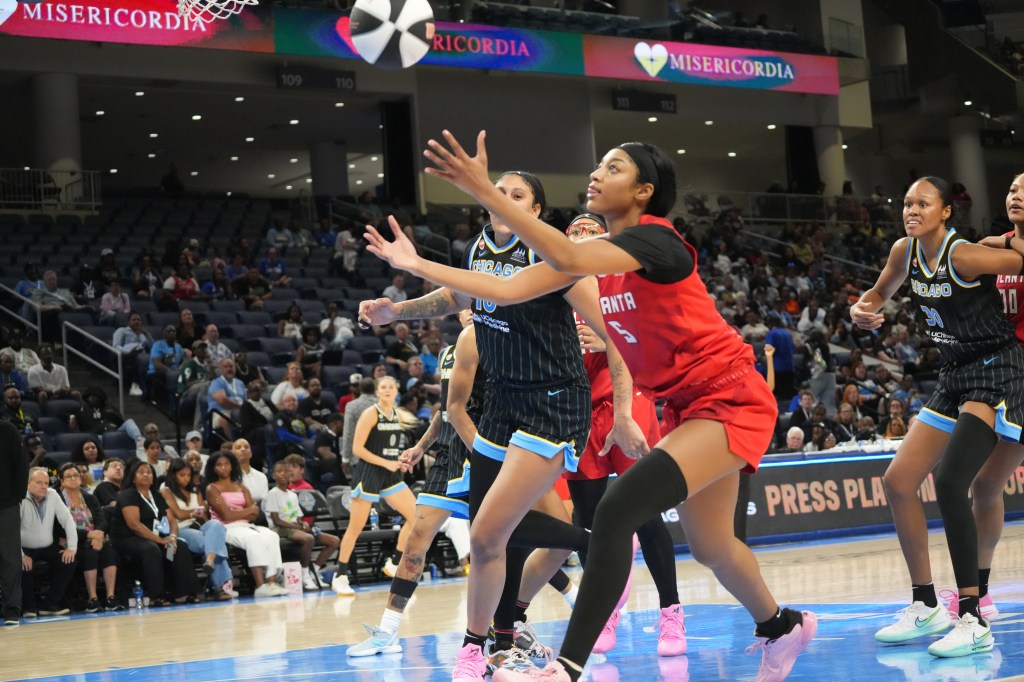 Angel Reese grabs a rebound during the Dream's win over the Sky on June 9, 2026 at Wintrust Arena.