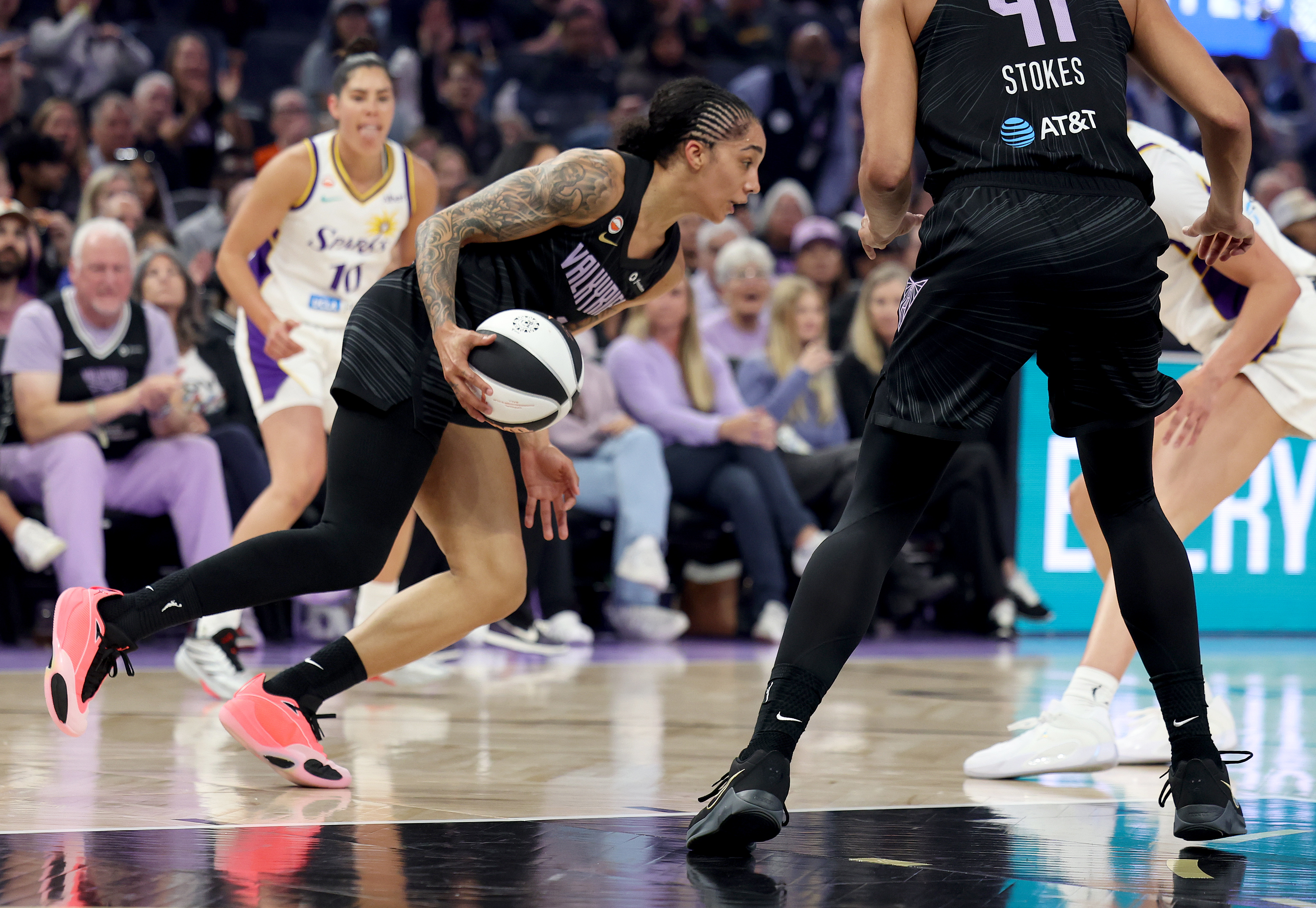Golden State Valkyries' Gabby Williams #1 heads down court after...