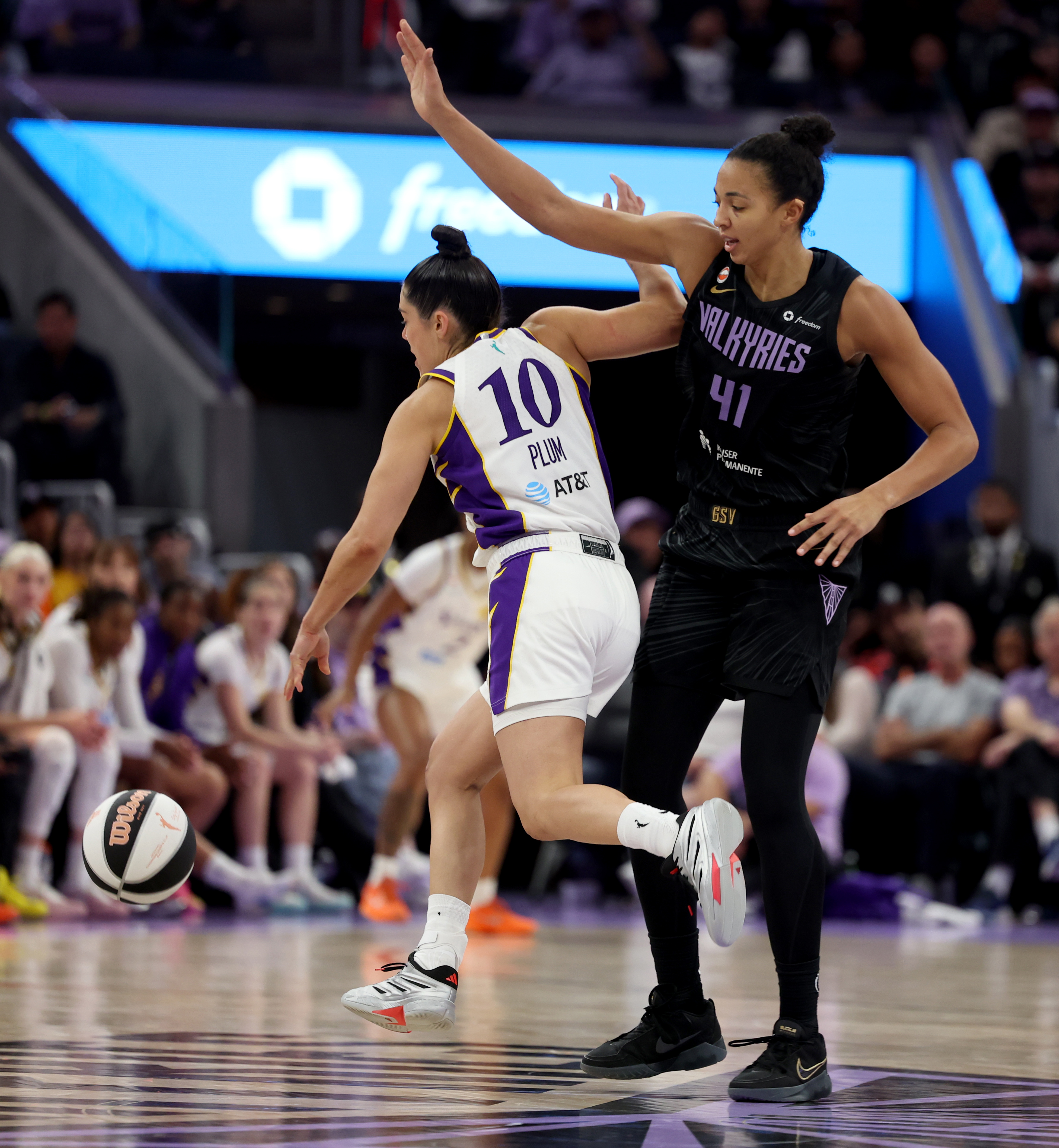 Golden State Valkyries' Kiah Stokes #41 fouls Los Angeles Sparks'...