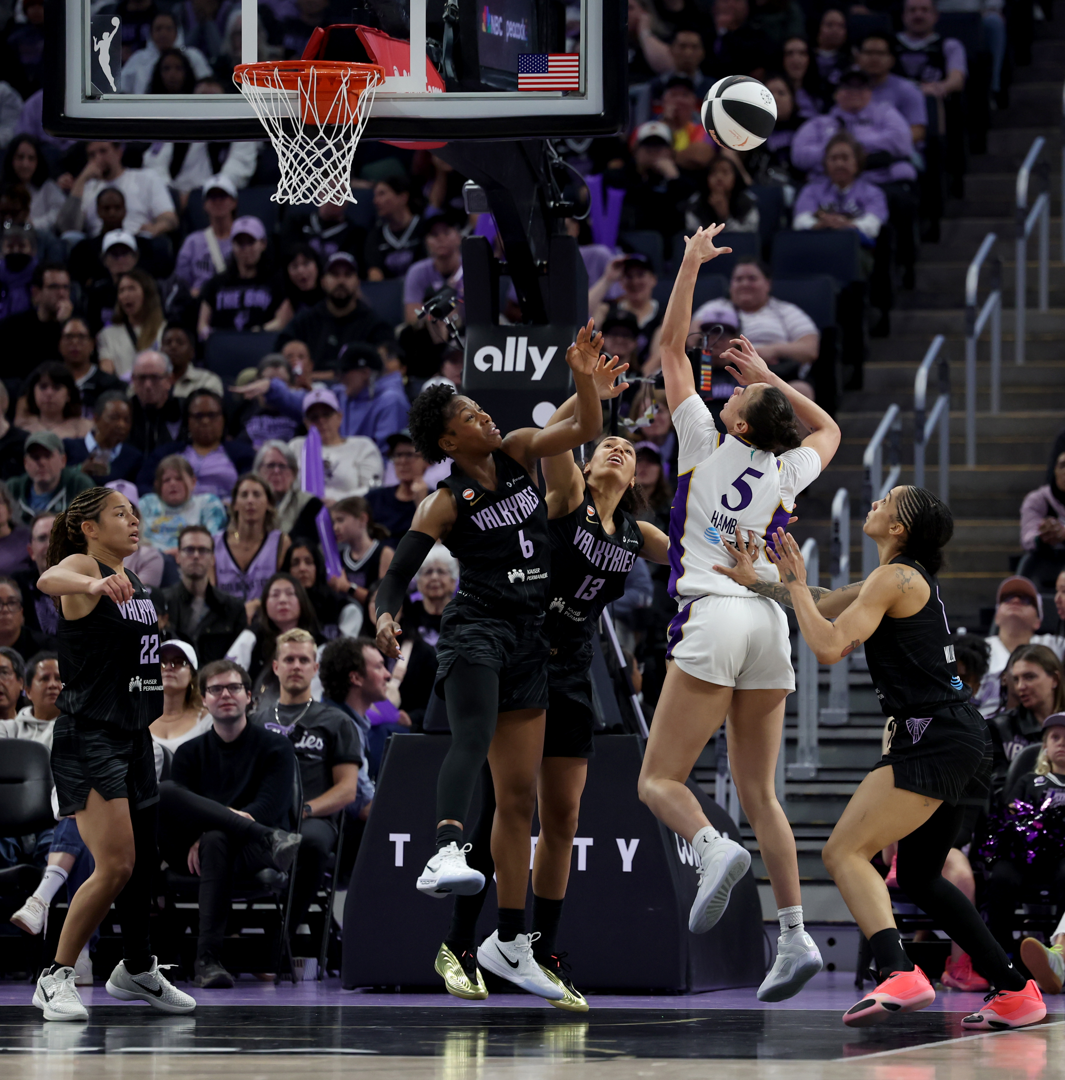 Los Angeles Sparks' Dearica Hamby #5 shoots past Golden State...