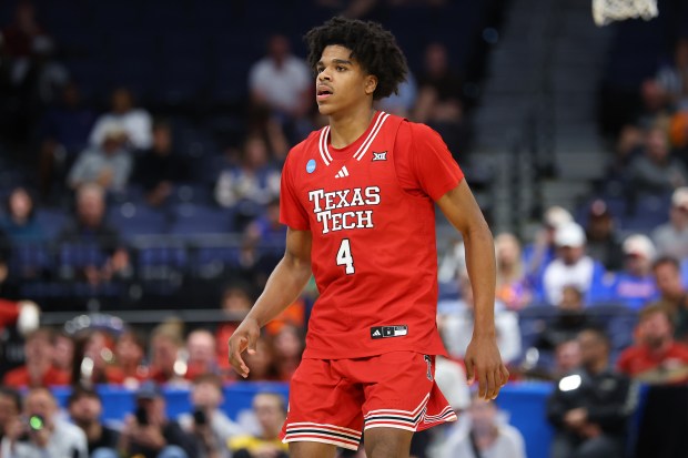 Christian Anderson #4 of the Texas Tech Red Raiders looks on against the Alabama Crimson Tide during the second half in the second round of the 2026 NCAA Men's Basketball Tournament at Benchmark International Arena on March 22, 2026 in Tampa, Florida. (Photo by Mike Carlson/Getty Images)