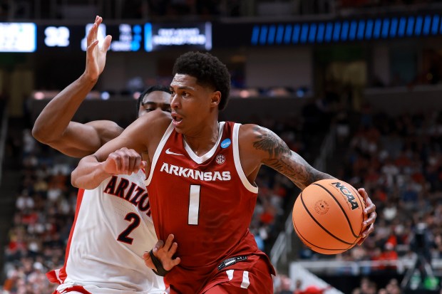 Meleek Thomas #1 of the Arkansas Razorbacks dribbles the ball against the Arizona Wildcats during the first half in the Sweet Sixteen of the 2026 NCAA Men's Basketball Tournament at SAP Center on March 26, 2026 in San Jose, California. (Photo by Ezra Shaw/Getty Images)