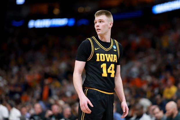 Bennett Stirtz #14 of the Iowa Hawkeyes reacts against the Illinois Fighting Illini during the first half in the Elite Eight of the 2026 NCAA Men's Basketball Tournament at Toyota Center on March 28, 2026 in Houston, Texas. (Photo by Kenneth Richmond/Getty Images)
