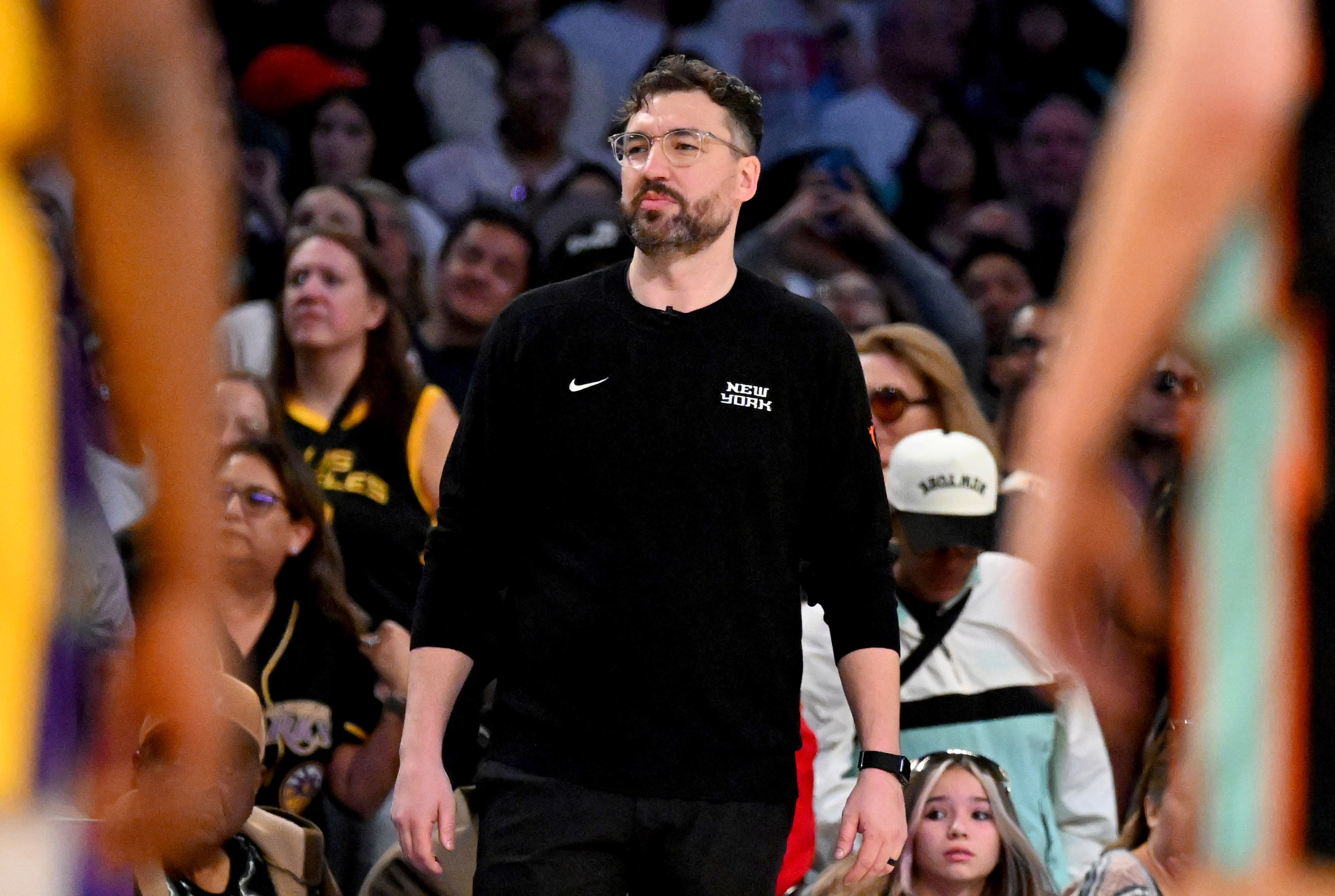 New York Liberty head coach Chris DeMarco looks on in...