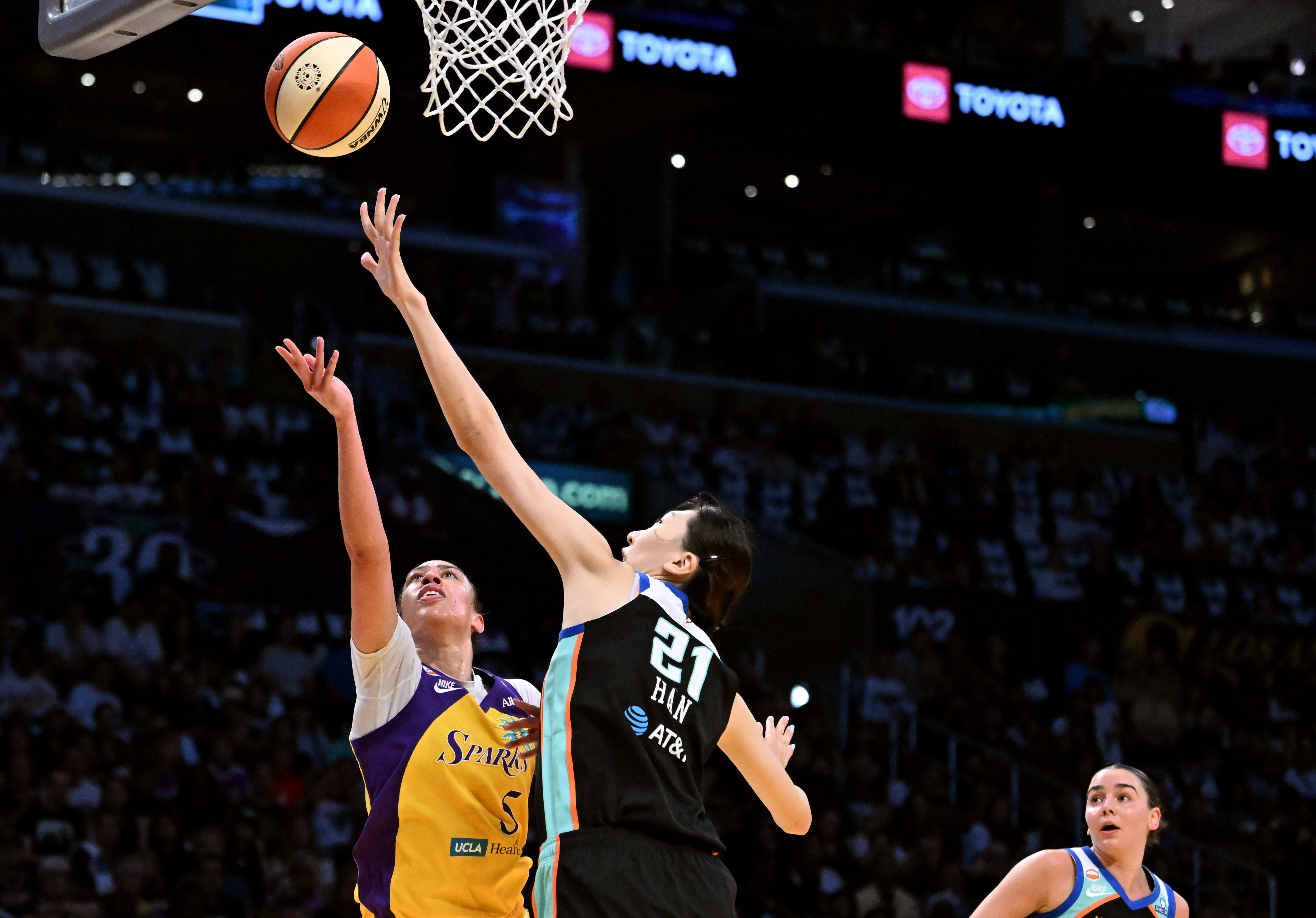 Sparks forward Dearica Hamby (5) takes a shot past New...
