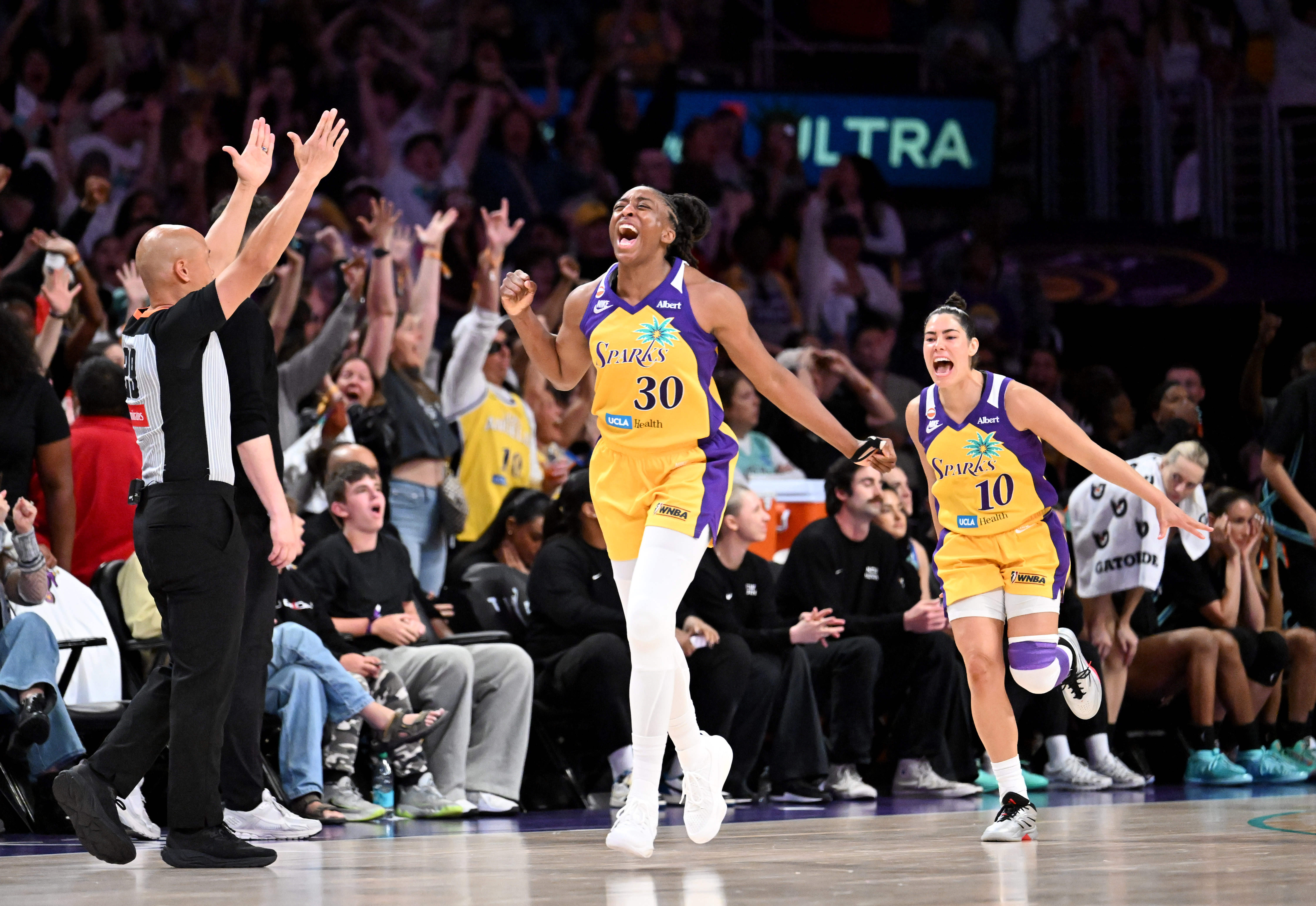 Sparks Nneka Ogwumike (30) reacts after taking the game winning...