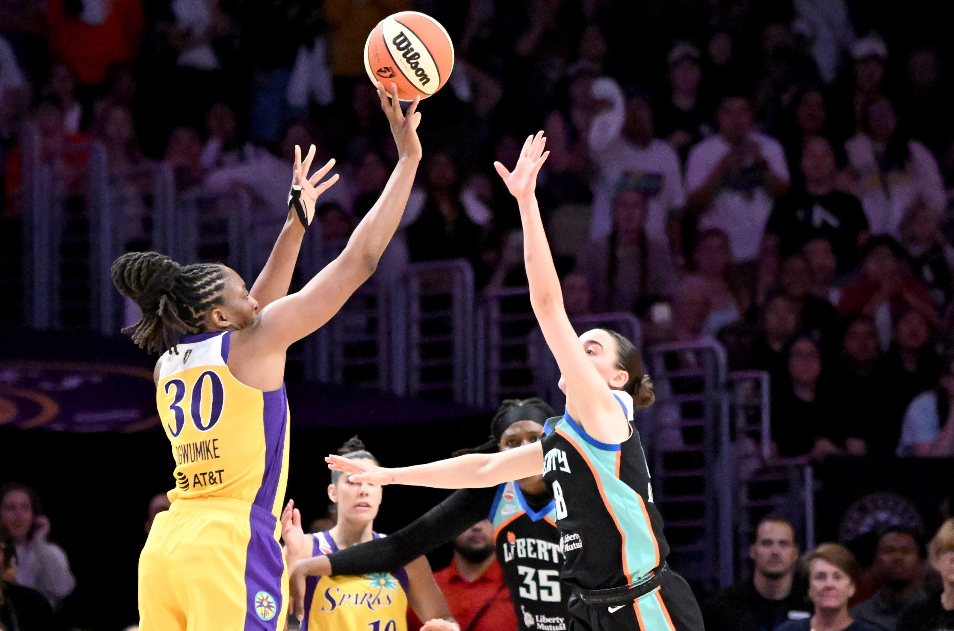 Sparks forward Nneka Ogwumike (30) takes a three point shot...