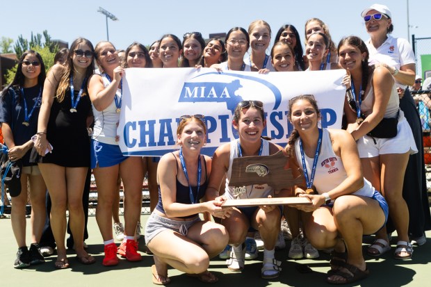 Members of Newton South celebrate after securing the team title at the MIAA Div. 1 tennis state final. (Libby O'Neill/Boston Herald)