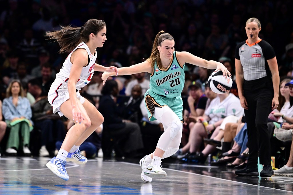 Sabrina Ionescu #20 of the New York Liberty handles the ball during the game against the Washington Mystics during the WNBA Commissioner's Cup on June 14, 2026 at Barclays Center Arena in Brooklyn, New York. 