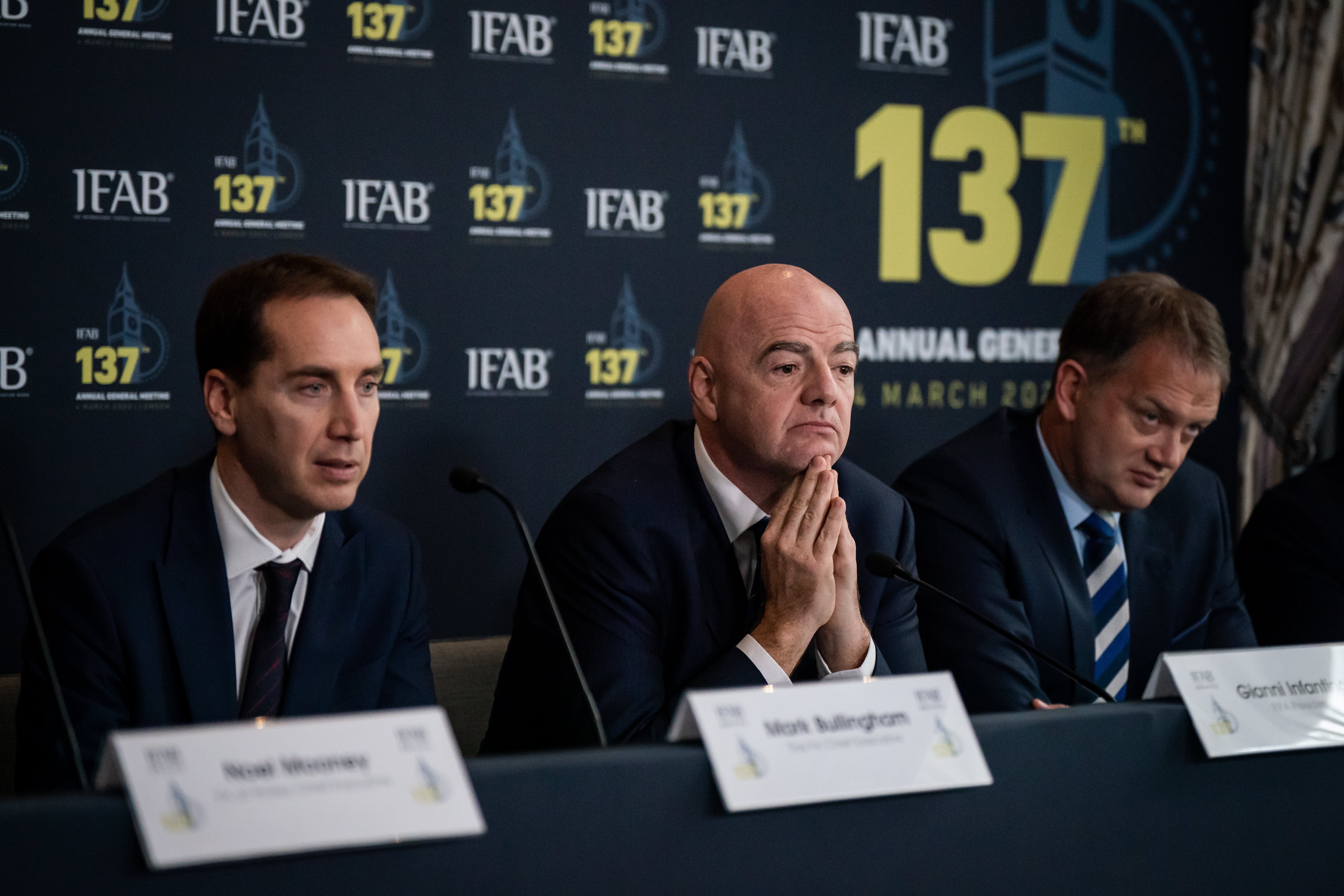 FA chief executive Mark Bullingham (left) next to Infantino (centre)