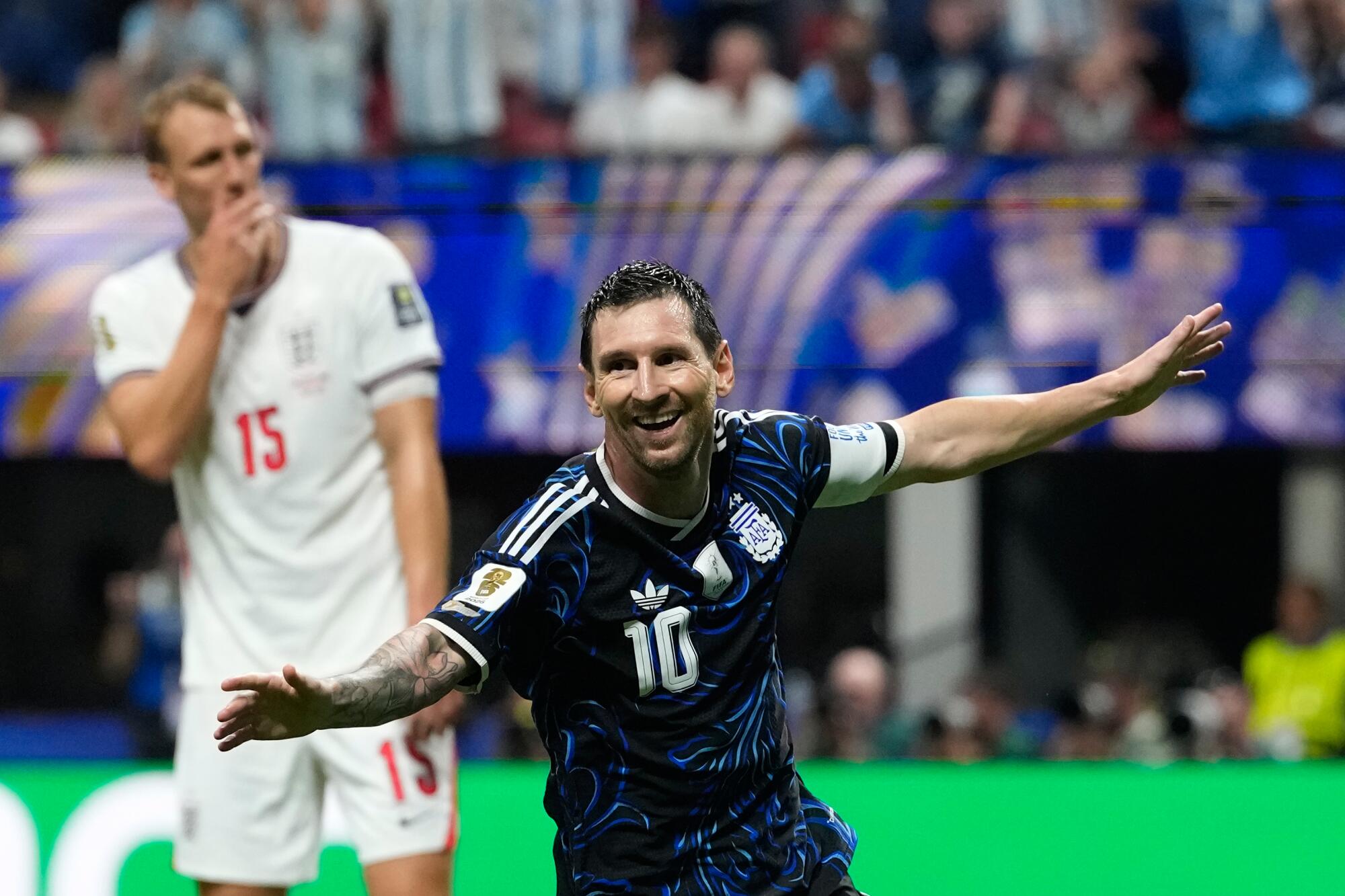Argentina's Lionel Messi celebrates after teammate Enzo Fernandez scored against England in Atlanta on Wednesday.