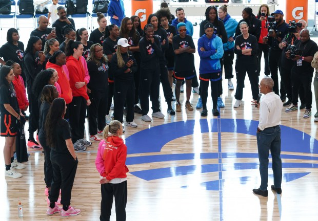 Former President Barack Obama speaks to WNBA players and coaches before an All-Star Game practice at Home Court on the Obama Presidential Center campus on July 24, 2026. (John J. Kim/Chicago Tribune)