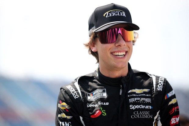Carson Hocevar, driver of the No. 77 Zeigler Auto Group Chevrolet, looks on during qualifying for the NASCAR Cup Series eero 400 at Chicagoland Speedway on July 4, 2026, in Joliet. (James Gilbert/Getty)