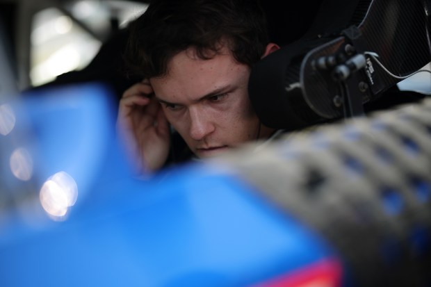 Corey Heim, driver of the No. 67 Shield AI Toyota, looks on in his car during qualifying for the NASCAR Cup Series eero 400 at Chicagoland Speedway on July 4, 2026, in Joliet. (Jonathan Bachman/Getty)