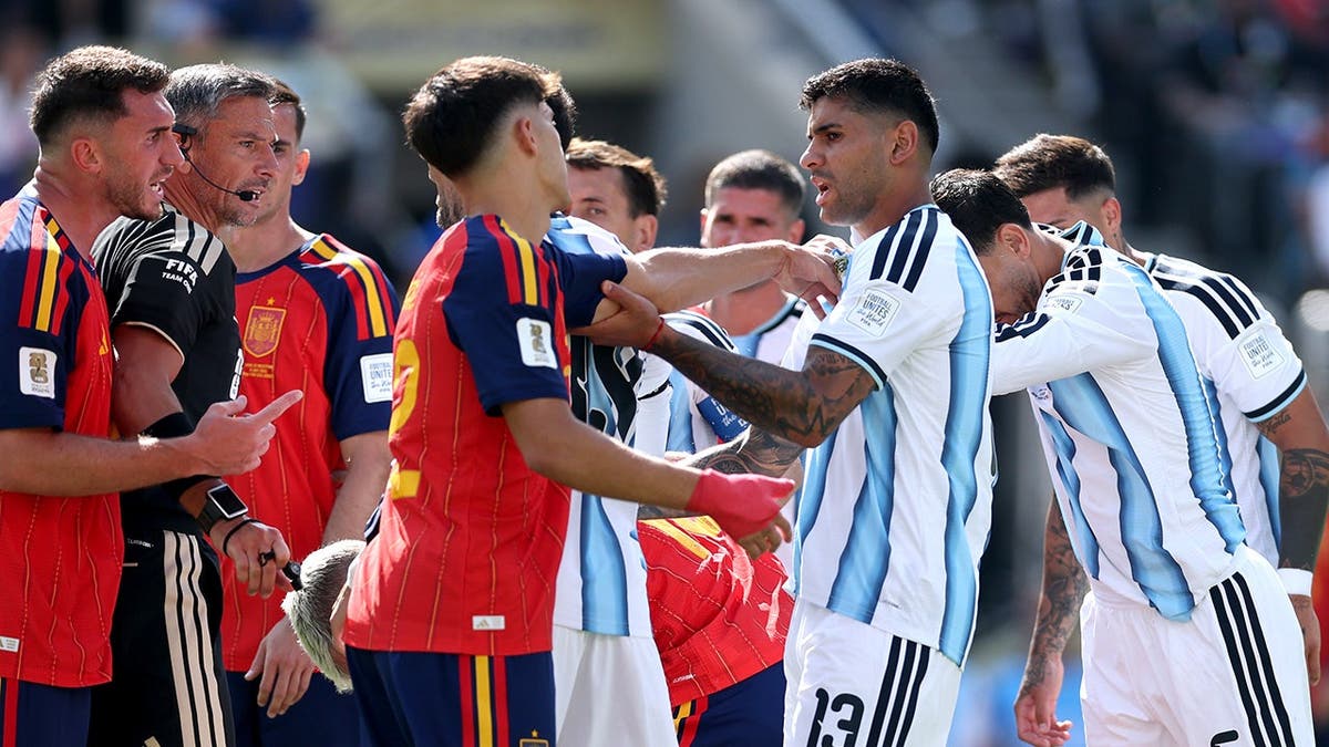 Players scuffle after a foul during Argentina vs. Spain in East Rutherford, New Jersey.