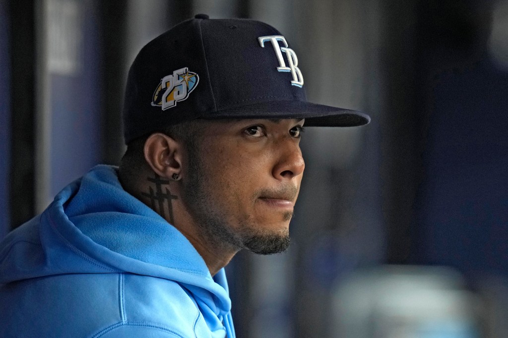 Tampa Bay Rays' Wander Franco watches from the dugout.