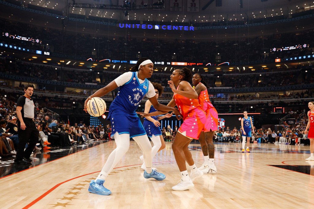 Team Spoon center Jonquel Jones (35) controls the ball against Team Coop during the WNBA All Star Game at United Center.