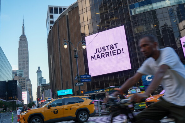 A "Just Married" sign is displayed on Madison Square Garden during a wedding between singer Taylor Swift and National Football League player Travis Kelce on Friday, July 3, 2026, in New York. (AP Photo/Ryan Murphy)